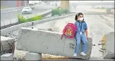  ?? BIPLOV BHUYAN/HT ?? ■
A girl wears a pollution mask in New Delhi. Pneumonia killed an estimated 126,535 children under the age of five in India in 2017, of which 27% were attributab­le to air pollution.