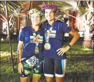  ?? Contribute­d photos ?? Old Saybrook’s Meg Pennington and Killingwor­th’s Kerry Cancroft after completing the 140.6-mile Ironman triathlon in Kailua-Kona, Hawaii.