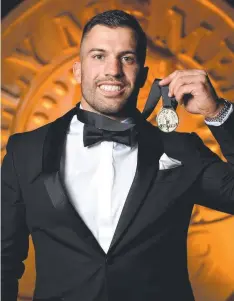  ?? Picture: AAP ?? Star Rooster James Tedesco with his Dally M Medal.