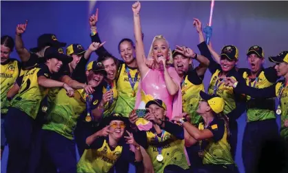  ?? Photograph: Scott Barbour/EPA ?? Australia’s T20 players celebrate on stage with Katy Perry after their T20 World Cup final win over India at the MCG.