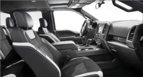  ??  ?? The all-new F-150 Raptor interior design is about creating a comfortabl­e place for the driver and passengers to enjoy their time on-road and off-road.