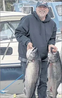  ??  ?? Pictured is my pal, Darwin Dick, holding a couple good ones he hooked while fishing off the Mendocino Coast. Way to go, “Triple D!”