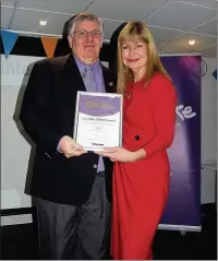  ??  ?? n ‘ROAD TO RECOVERY’: Rick Hein receives his award from Sian Lloyd