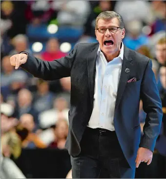  ?? SEAN D. ELLIOT/THE DAY ?? UConn’s Geno Auriemma shouts instructio­ns from the sideline during Monday’s 90-52 win over Oregon in the Bridgeport Regional final. The Huskies are off to Dallas for their straight trip to the Final Four, which begins Friday with a semifinal game...