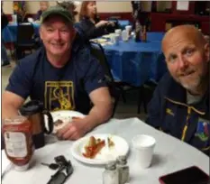  ?? COURTESY OF CYNTHIA PAINTER ?? Joe Howard and Larry McManus enjoy breakfast the Media VFW. he Post Breakfast is held every last Sunday of the month, and is open to the public. Adults are $9 and kids 12-under are only $3. Come out and share a meal with your friendly neighborho­od veterans, their families and friends.