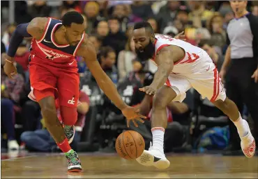  ?? File photo ?? After finishing second in MVP voting in 2015 and 2017, Houston Rockets wing James Harden (right) was named league MVP Monday after delivering 30.4 points, 8.8 assists and 5.4 rebounds a game.