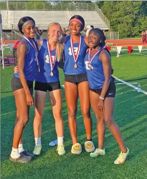  ?? Special to The Saline Courier ?? Bryant 4x200-meter relay team of, from left, Parris Atkins, Brilynn Findley, Lauren Lain and Zoe Wilson pose after breaking the school record at the Meet of Champs at Russellvil­le High School this past Wednesday. The foursome ran the relay in a time of 1:42.11 for third place at the MOC.