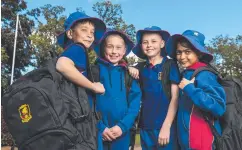  ?? Picture: Kevin Farmer ?? LODGED: Excited for Downlands College to welcome prep to year three from 2023 are (from left) Cohen Moore, Sophie Reynolds, Jaxson Parker and Sasithmi Kevitiyaga­la.