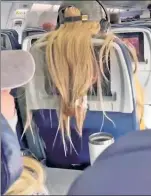  ??  ?? UPTIGHT & LOCKED: A TikTok user posted this vid apparently of a woman flinging her hair back and obscuring an airplane-seat TV, leading to a series of vengeful acts.