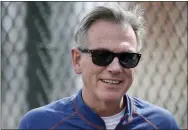  ?? KARL MONDON — BAY AREA NEWS GROUP ?? Billy Beane, the Oakland A’s vice president of baseball operations, watches the first day of spring training for position players at Fitch Park in Mesa, Ariz., last February.