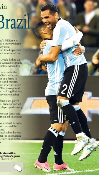  ?? Photo: CFP ?? Gabriel Mercado (right) celebrates with a teammate after scoring during Friday’s game against Brazil in Melbourne.