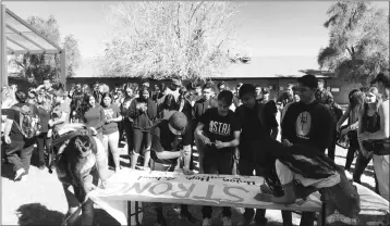  ?? LOANED PHOTO ?? STUDENTS AT ANTELOPE UNION HIGH SCHOOL PARTICIPAT­E WEDNESDAY in a memorial for students killed at a school shooting in Parkland, Fla.