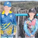  ??  ?? Nicholas and Riley Stokes at Wallaman Falls.