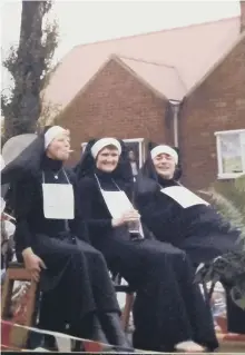  ??  ?? Nuns on parade, including Peter Barella on the right.