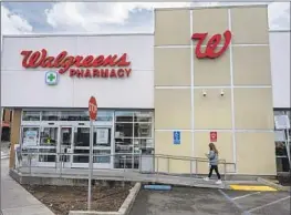  ?? David Paul Morris Bloomberg ?? WALGREENS says it won’t distribute or ship a drug used for medication abortions in at least 21 red states, including at least four where abortions remain legal.