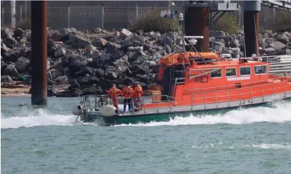  ?? ?? Six people died and more than 50 were rescued after their boat capsized near Calais. Photograph: Pascal Rossignol/Reuters