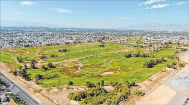  ?? Michael Quine Las Vegas Review-journal @Vegas88s ?? The Clark County Commission approved plans last week to rezone the Royal Links Golf Club for residentia­l use.