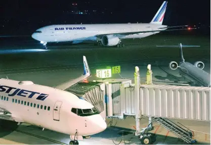  ??  ?? HALIFAX: Air France Flight 55 taxis to the terminal at Halifax Stanfield Internatio­nal Airport yesterday. The flight was on its way from Washington, DC to Paris when it made an emergency landing in Halifax after the airline received anonymous threats....