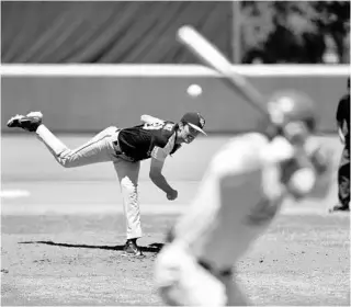  ?? COURTESY OF UCF ATHLETICS ?? UCF redshirt junior pitcher Kyle Kramer throws to home plate during Game 3 against South Florida on Sunday in Tampa.