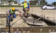  ??  ?? LAYING FOUNDATION­S: Constructi­on of 547 semi-detached and detached single-storey houses in Morkel’s Cottage, Strand, got under way yesterday.