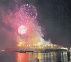  ??  ?? It all started so well: fireworks light up the sky to mark the QE2’s final journey