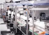  ?? SARA HYLTON/BLOOMBERG ?? Containers move along a conveyor on the packaging line for metformin pills at a Laurus Labs pharmaceut­ical plant based in Visakhapat­nam, India, in November.