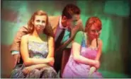  ??  ?? Chloe Marturano (Margie), left, Joshua Klusewitz (Albert Peterson) and Mandy Maiers (Nancy/Gloria Rasputin) are shown in a scene from “Bye Bye Birdie” at Genesius Theatre.