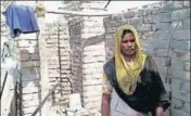  ?? HT PHOTO ?? Kulwinder Kaur, a beneficiar­y, outside her underconst­ruction toilet at a village in Muktsar on Wednesday.