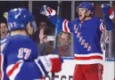  ?? Associated Press photo ?? New York Rangers right wing Michael Grabner (40) reacts after scoring a goal against the Philadelph­ia Flyers during the second period of an NHL hockey game Jan. 16 in New York.