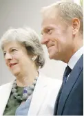  ??  ?? British Prime Minister Theresa May meets with European Council President Donald Tusk during an EU summit in Brussels on Friday to weigh progress of Brexit negotiatio­ns.