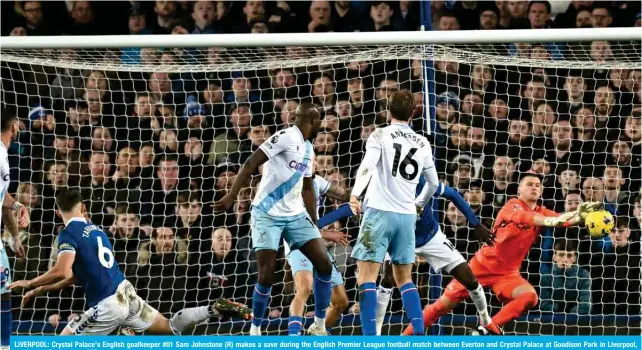  ?? ?? LIVERPOOL: Crystal Palace’s English goalkeeper #01 Sam Johnstone (R) makes a save during the English Premier League football match between Everton and Crystal Palace at Goodison Park in Liverpool, north west England. — AFP