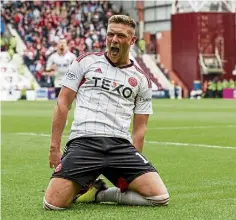  ?? ?? Mattie Pollock celebrates making it 1-0 for Aberdeen,