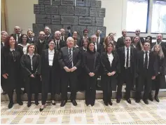  ?? (Mark Neyman/GPO) ?? PRESIDENT REUVEN RIVLIN, flanked by Supreme Court Chief Justice Esther Hayut and Justice Minister Ayelet Shaked, is joined by the new judges at a swearing-in ceremony at the President’s Residence in Jerusalem yesterday.