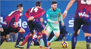  ?? VINCENT WEST / REUTERS ?? Barcelona's Lionel Messi in action against Eibar in a La Liga match on Sunday.