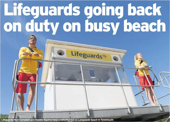  ??  ?? Lifeguards Nick Campbell and Maddie Squires keep a watchful eye on Longsands beach in Tynemouth