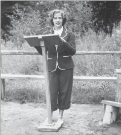  ?? AP-HONS ?? This 1948 photo provided by the Supreme Court shows Ruth Bader, at age 15, giving a sermon as the camp rabbi at Che-Na- Wah in Minerva, N.Y. Ginsburg spoke publicly about her religious foundation­s growing up during the Holocaust and before bat mitzvahs — coming-of-age ceremonies for girls — were commonplac­e.