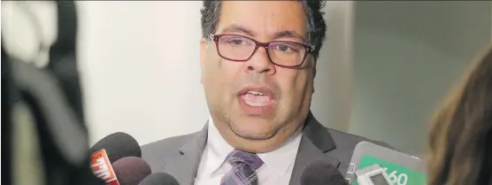  ?? MIKE DREW ?? Mayor Naheed Nenshi says he’s pleased that council passed a budget that “brings forward hundreds of millions of dollars in savings on the capital and operating side.”