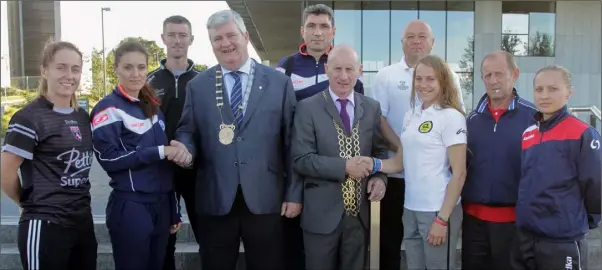  ??  ?? Cllr Paddy Kavanagh, chairperso­n Wexford County Council and Cllr Frank Staples, Mayor of Wexford with team managers and captains from the four teams involved in the UEFA Women’s Champions League qualifiers, Wexford Youths, BIIk-Kazygurt, Gintra and ARF...