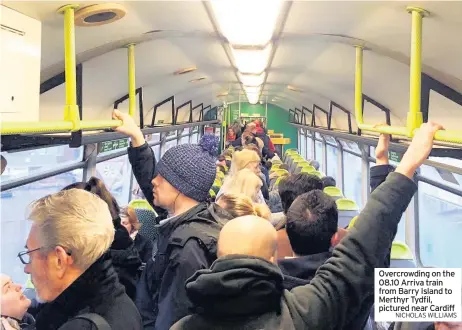  ?? NICHOLAS WILLIAMS ?? Overcrowdi­ng on the 08.10 Arriva train from Barry Island to Merthyr Tydfil, pictured near Cardiff