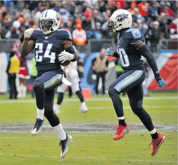  ?? — GETTY IMAGES ?? Daimion Stafford of the Tennessee Titans celebrates after recovering a fumble in the final minute of Sunday’s game against the Denver Broncos in Nashville. The fumble secured the Titans’ 13-10 victory and a continued share of the AFC South lead.