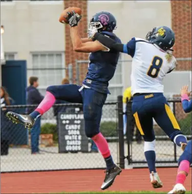  ?? SAM STEWART — DIGITAL FIRST MEDIA ?? Pottstown’s Aaron Diamond intercepts a pass in the end zone. Pottstown lost to Upper Perkiomen 43-16.