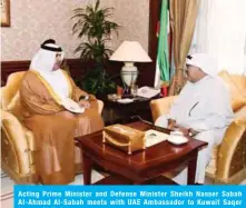  ??  ?? Acting Prime Minister and Defense Minister Sheikh Nasser Sabah Al-Ahmad Al-Sabah meets with UAE Ambassador to Kuwait Saqer Nasser Al-Raisi.
