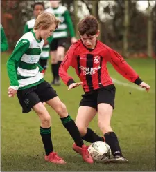  ??  ?? Filip Klempka of Gorey Celtic battling with TomFunge (Gorey Rangers).