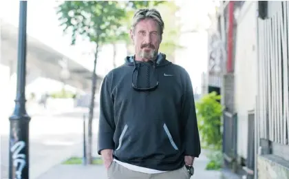  ?? GRAHAM HUGHES/THE CANADIAN PRESS ?? Anti-virus pioneer John McAfee, a former fugitive from the Belize government, is in Canada working on a documentar­y about his experience­s. He says he takes elaborate precaution­s against government surveillan­ce based upon his personal knowledge of...