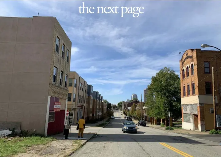  ?? David S. Rotenstein photos ?? Wylie Avenue, October 2019. The Crawford Grill No. 2 building is on the right. The men on the left asked the author if he was planning to tear down the building.