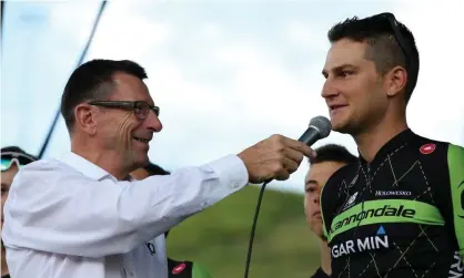  ?? Photograph: Chris Graythen/Getty Images ?? Paul Sherwen interviews Edward King of team Cannondale-Garmin during team presentati­ons ahead of the 2015 USA Pro Challenge.
