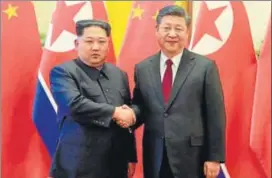  ?? REUTERS ?? North Korean leader Kim Jong Un shakes hands with Chinese President Xi Jinping in Beijing.