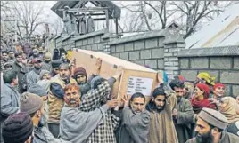 ?? WASEEM ANDRABI/HT ?? Kashmiri villagers carry the body of soldier Mohammad Iqbal Sheikh, who was killed in the Sunjuwan military camp attack along with his father, in Tral area on Tuesday.