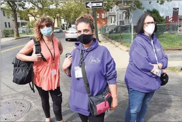  ?? Arnold Gold / Hearst Connecticu­t Media ?? From left, Christine, an active sex worker and outreach worker for SWAN (Sex Workers and Allies Network); Jennifer, also of SWAN; and Beatrice Cordianni, founder and executive director of SWAN, are photograph­ed on Ferry Street in New Haven on Friday.