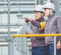  ?? Courtesy of Kumho Petrochemi­cal ?? Kumho Petrochemi­cal employees check facility safety at one of its factories in this file photo.